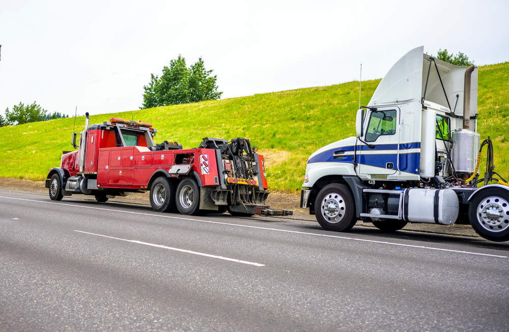 Towing and roadside assistance truck towing